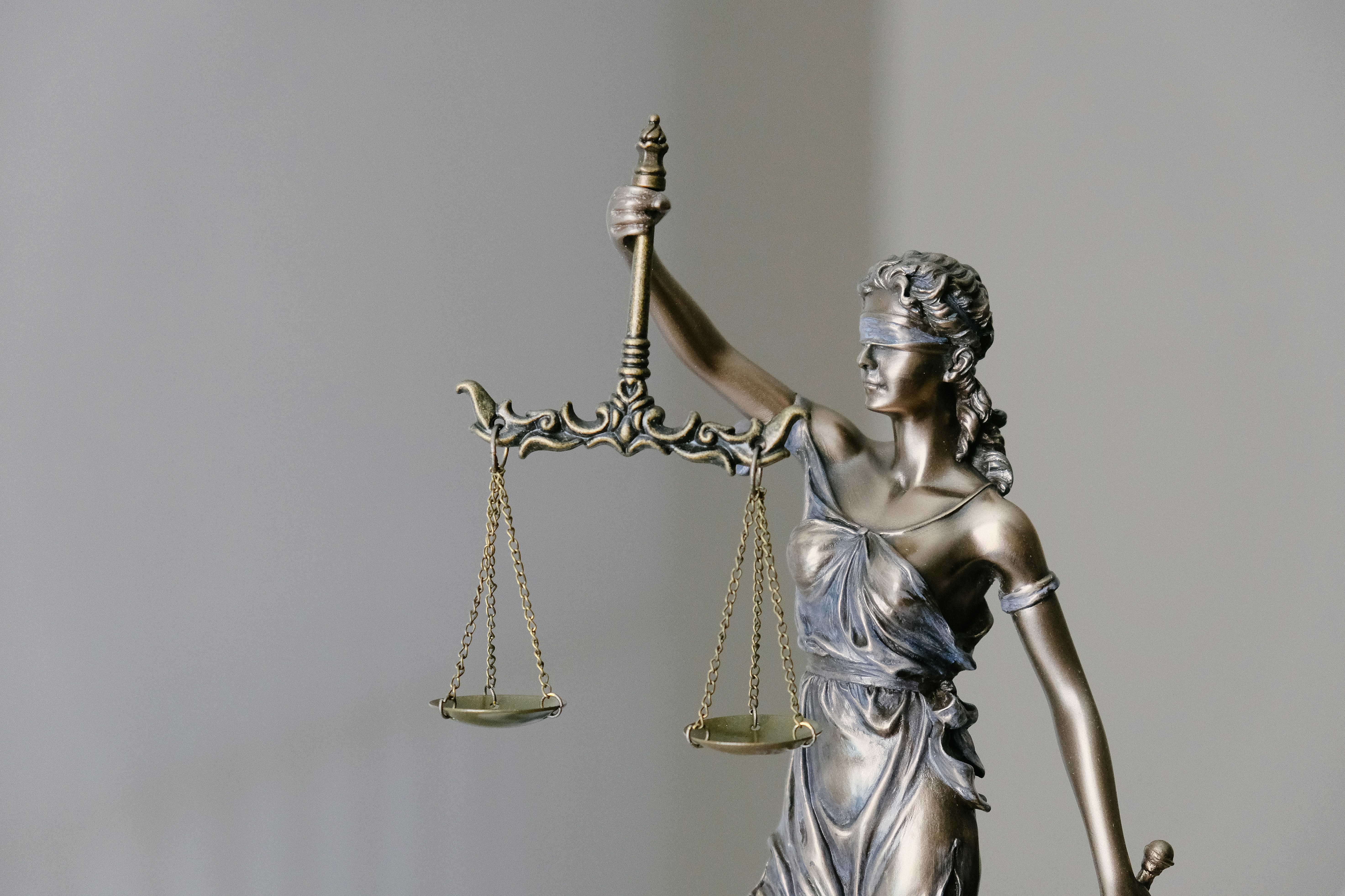 Lady Justice statue holding scales